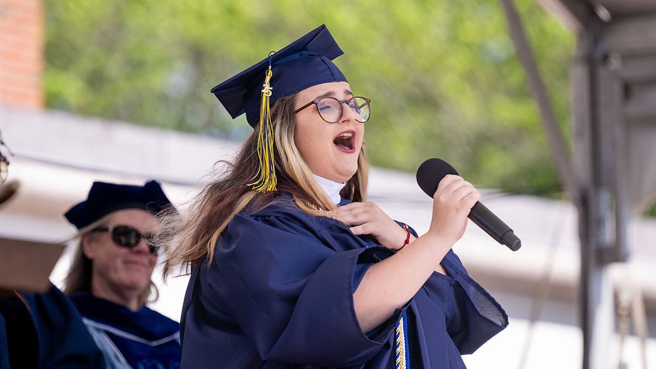 Sasha Zoe Zarzhevsky '25 sings the national anthem