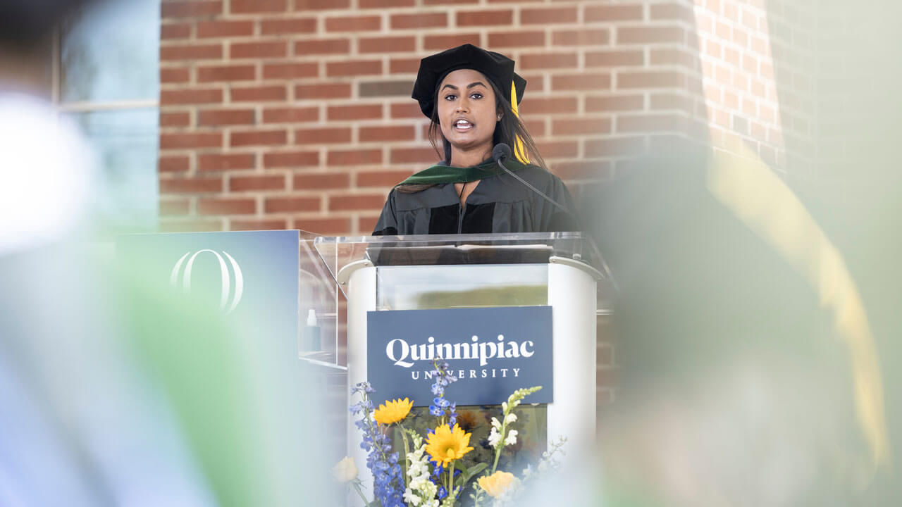School of medicine graduate, Sneha Alaparthi, MD '21 giving the student remarks speech