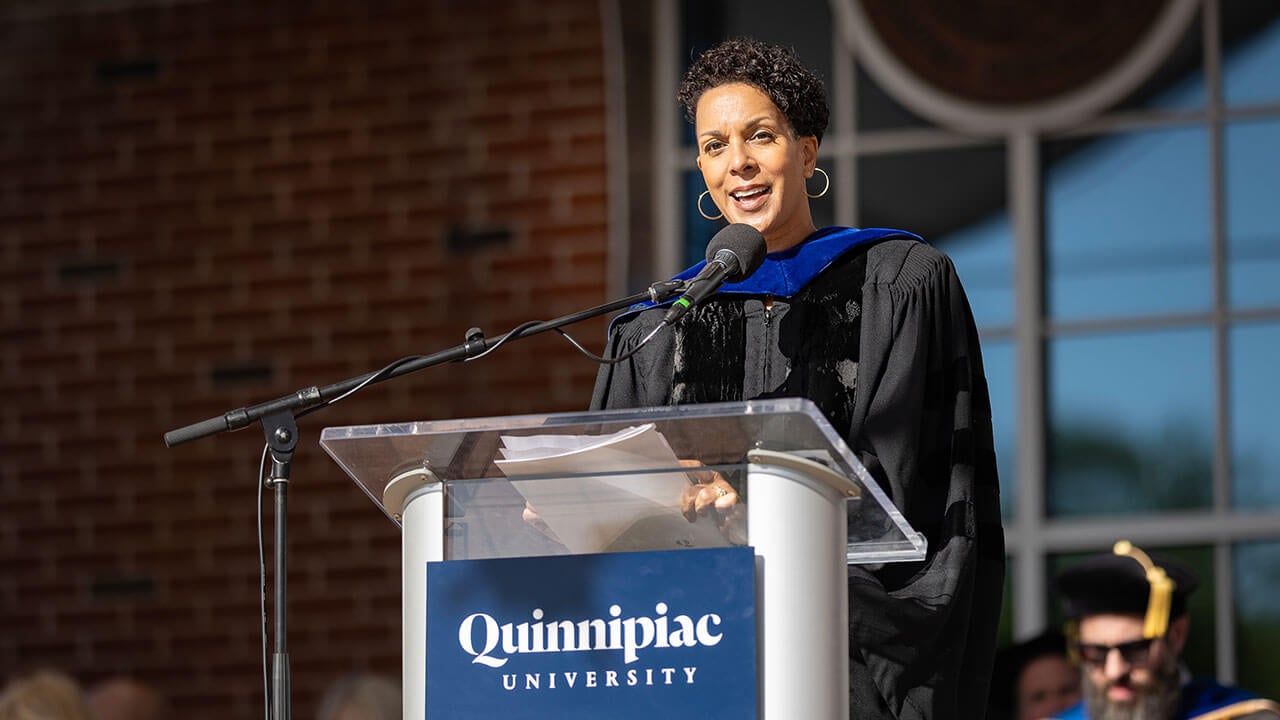 A speaker on the commencement stage