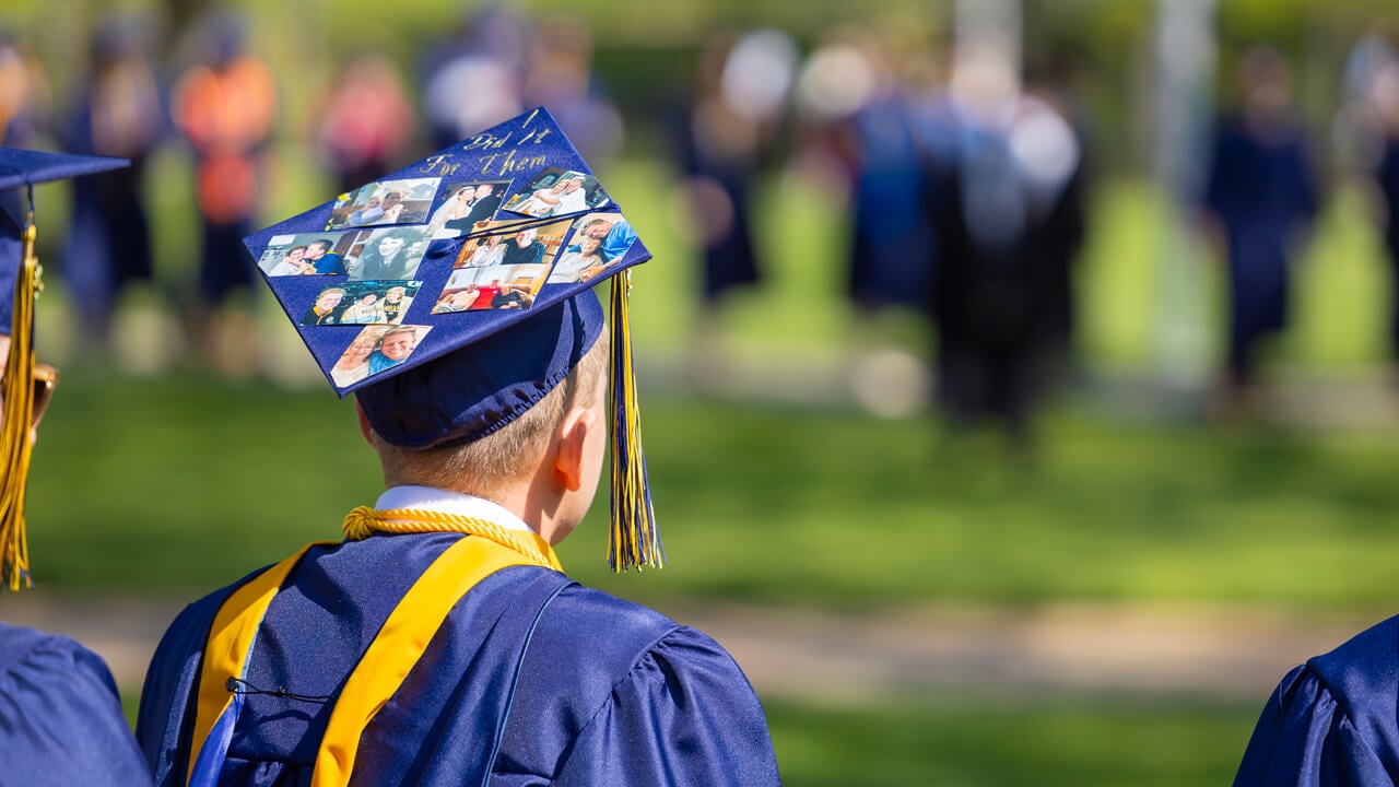 The back of a graduate's cap that is decorated