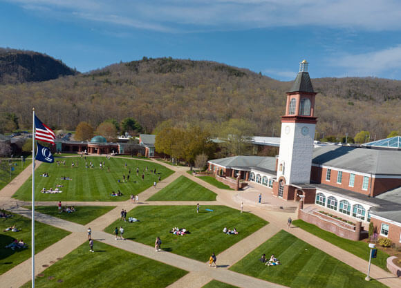 Sky view shot looking down on the lush grass located on Mount Carmel Campus's quad