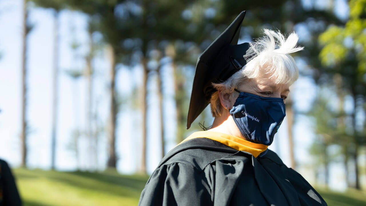 Woman standing in the pine grove