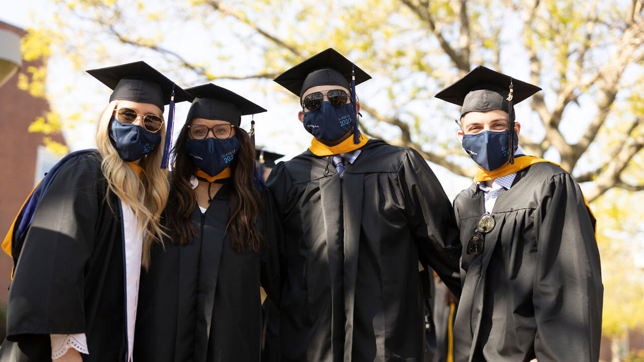 2020 graduates posing for picture