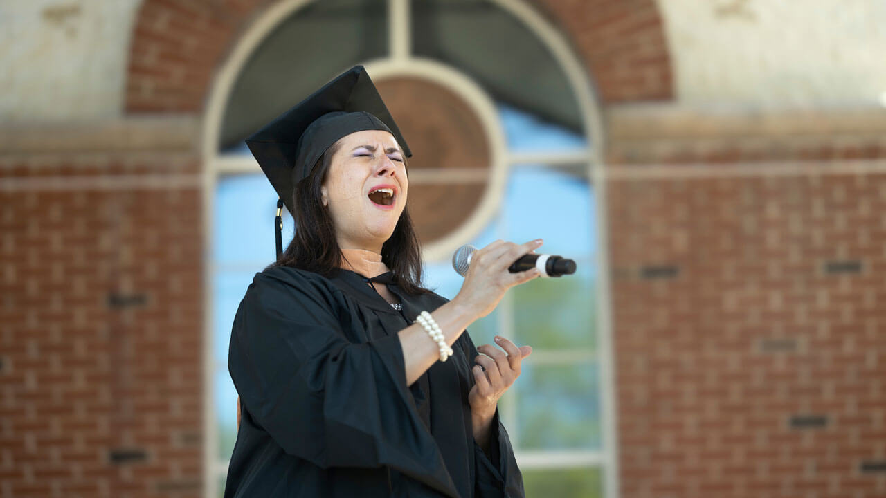 Lissette Chao singing national anthem