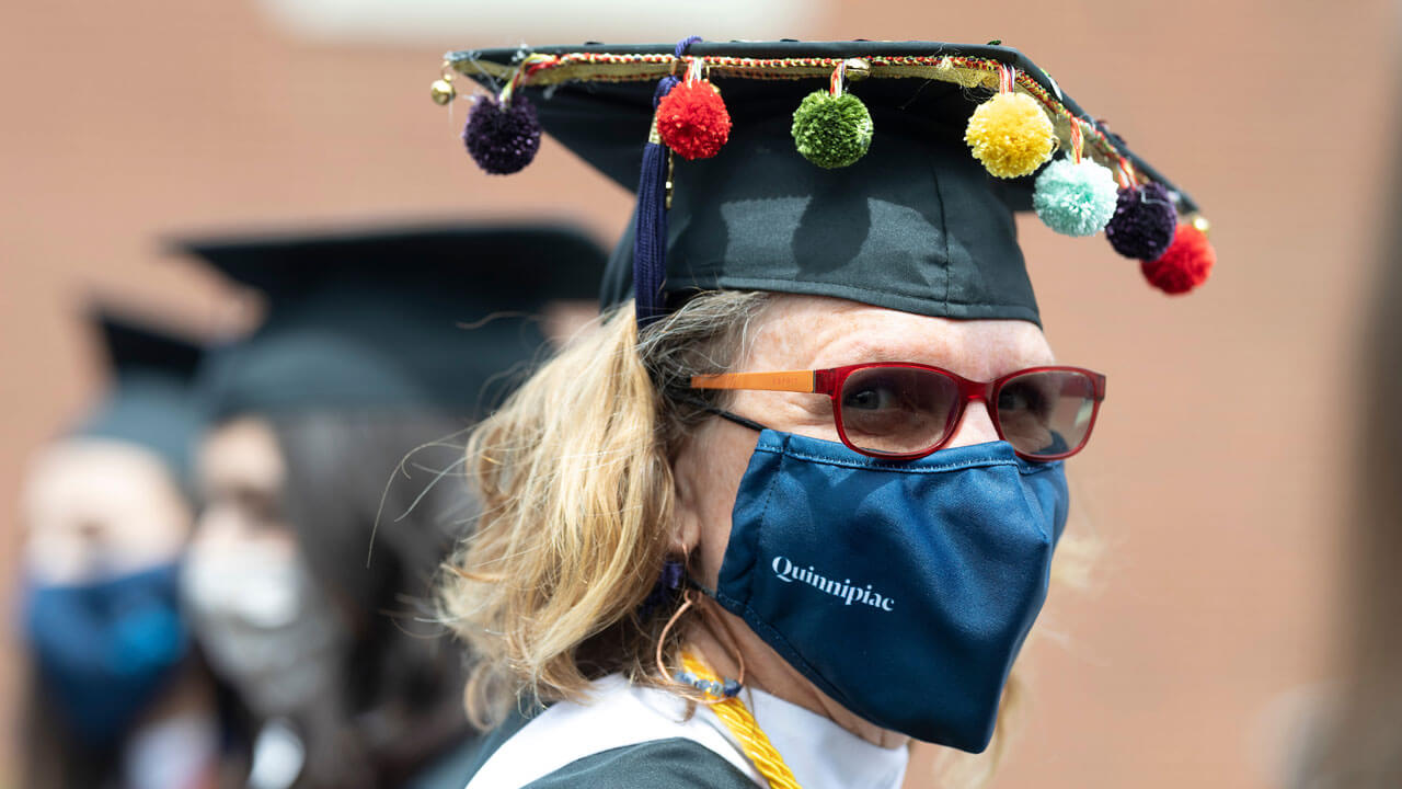 Person standing next to buckman center