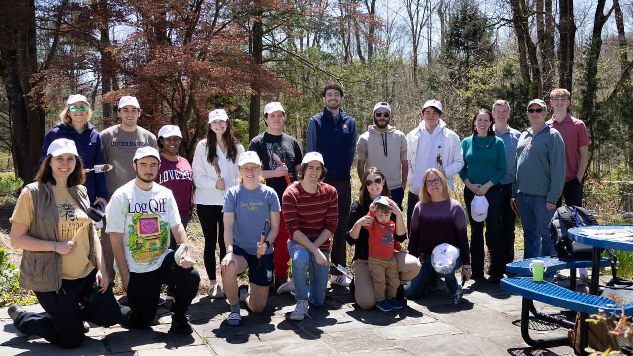 Arbor Day student and faculty volunteers smile for group photo