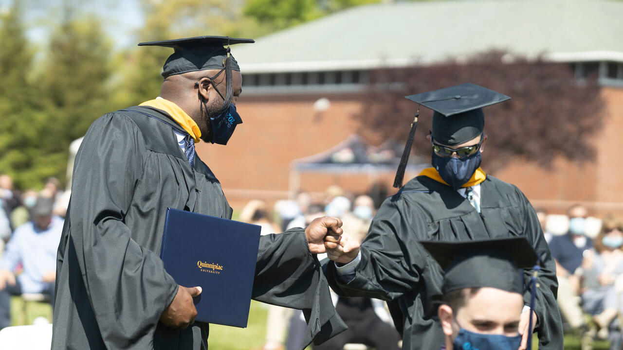 Graduates standing in the crowd