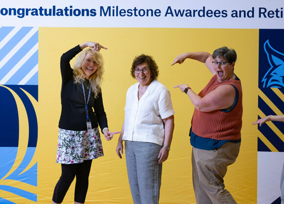 Individuals posing for a photo