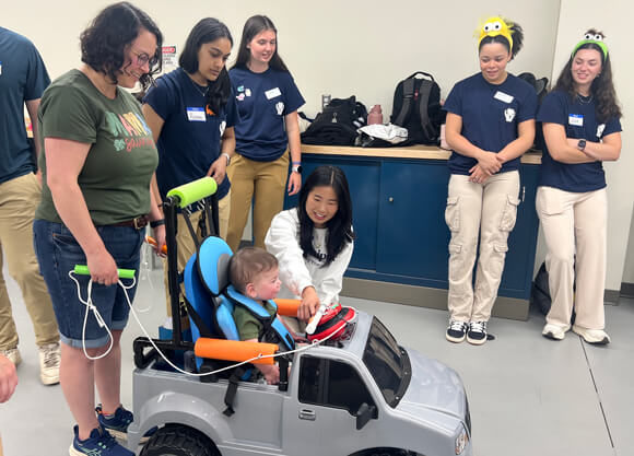 Person sitting a motorized car
