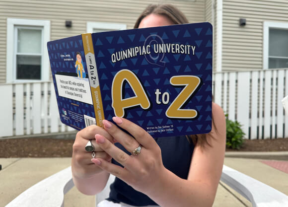 Person holding children's book