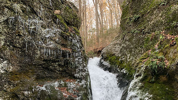 A waterfall flows at Indian Wells State Park