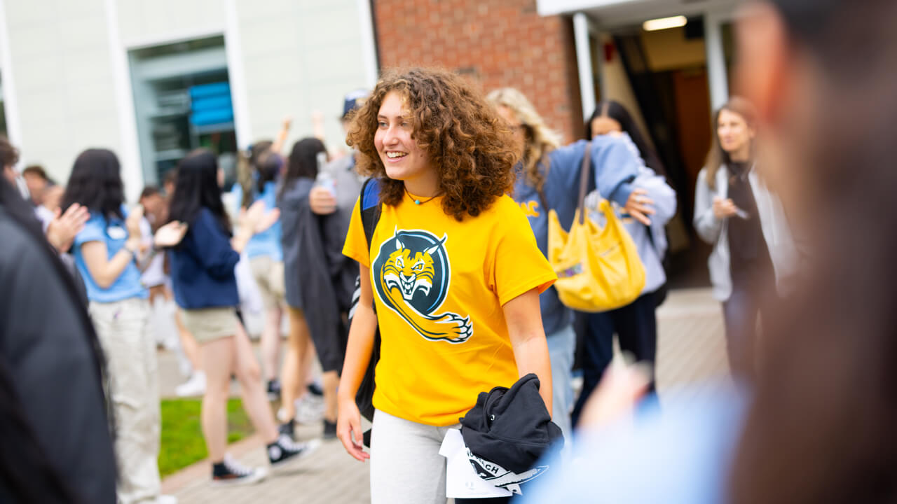 Individual walking out of the Recreation and Wellness Center