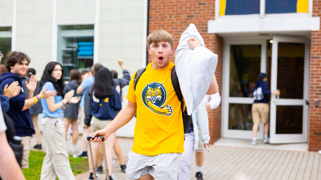 Individual walking out of the Recreation and Wellness Center