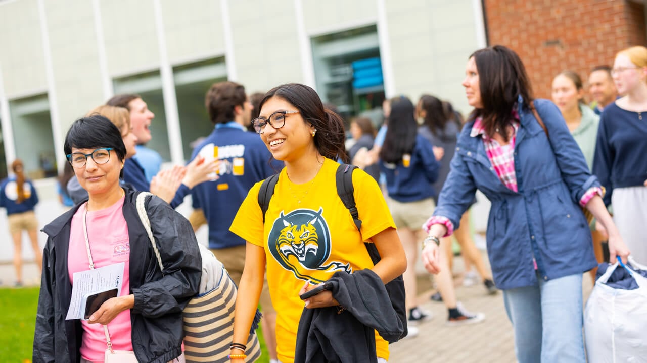 Individuals walking out of the Recreation and Wellness Center