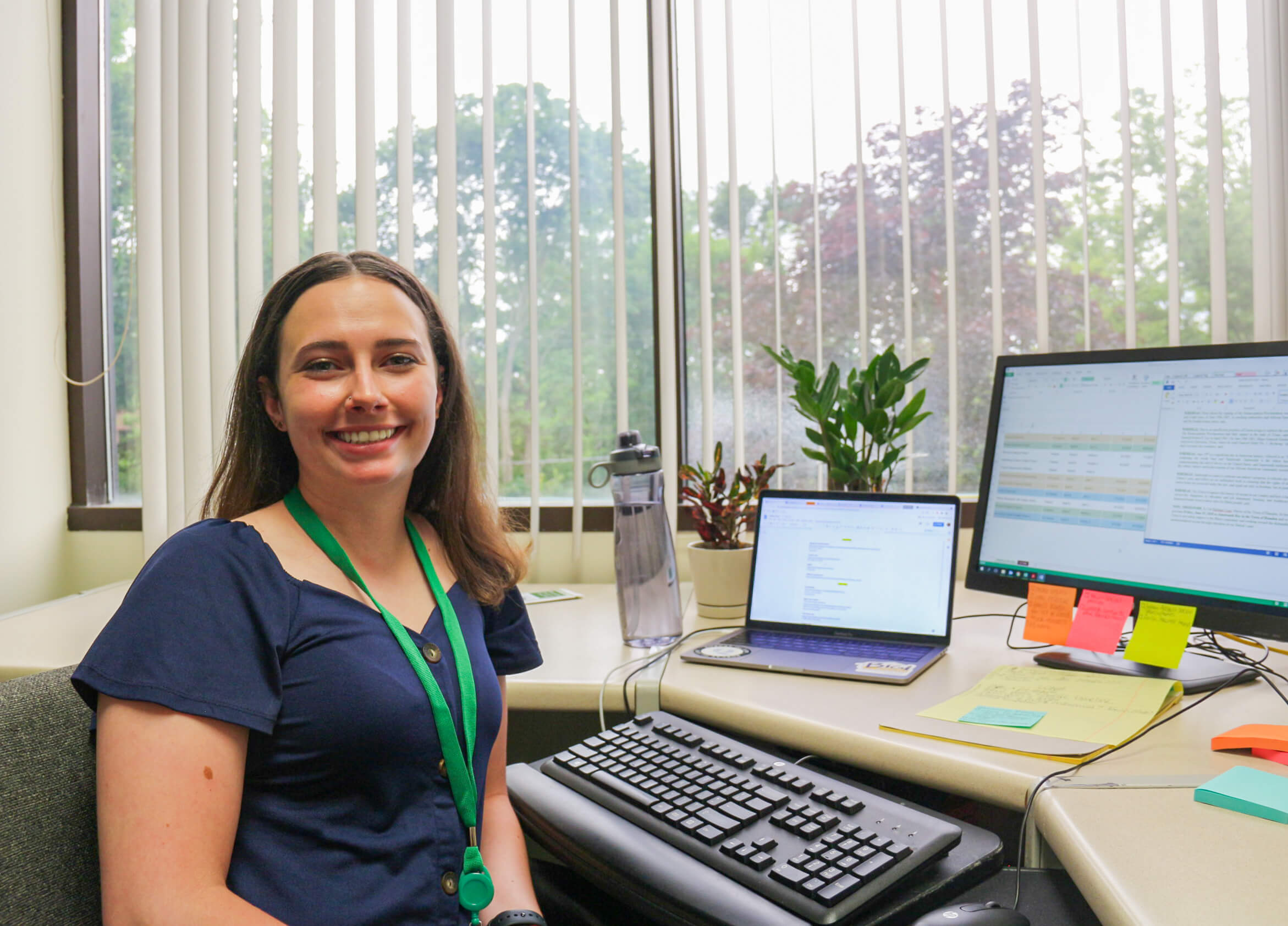 Madison Stout sits at her desk in the Hamden Mayor's Office
