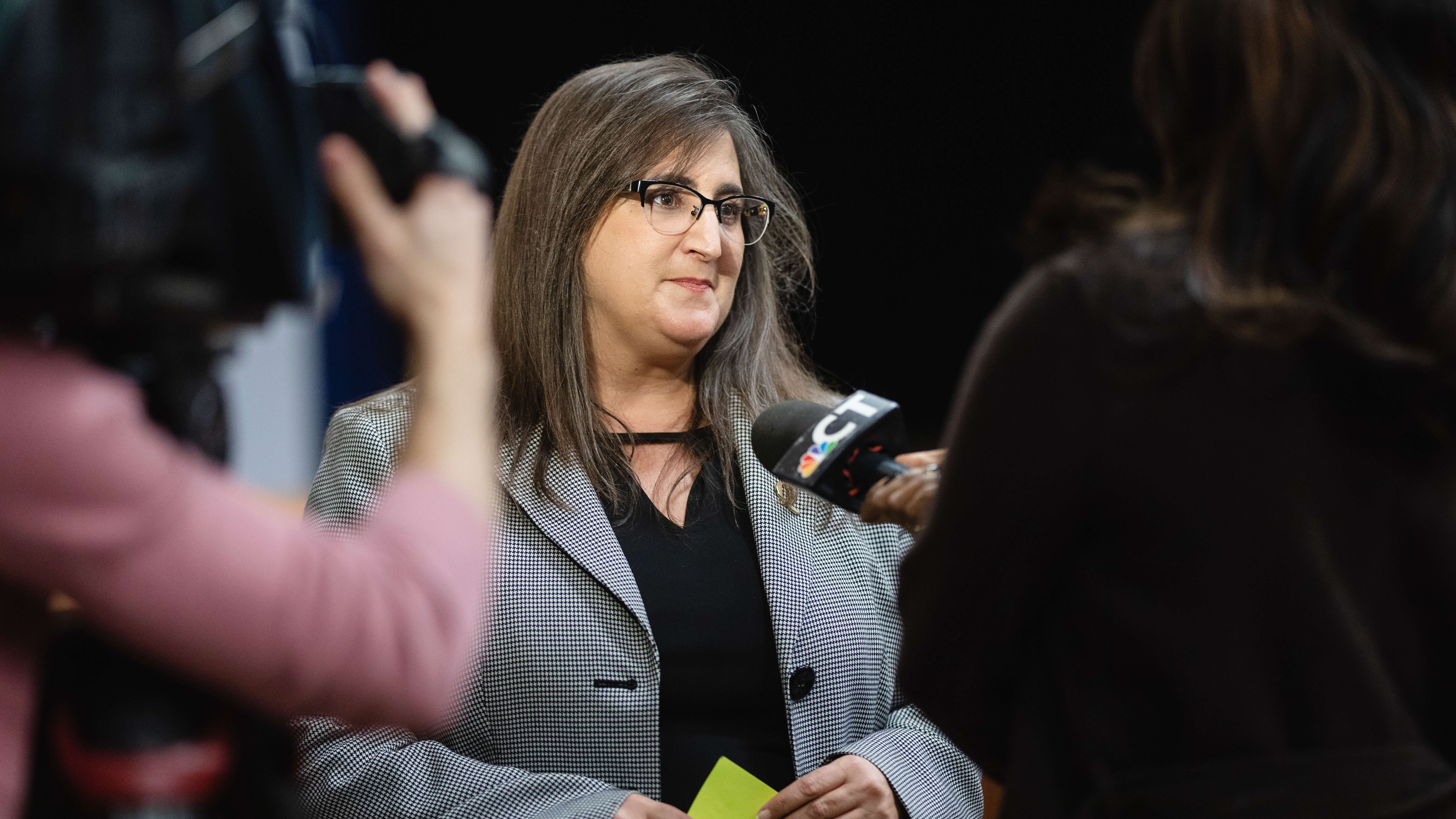 Janelle Chiasera speaks with media members