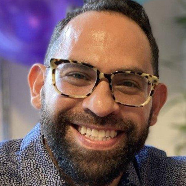 Headshot of Chester Fernandez, a new School of Law professor