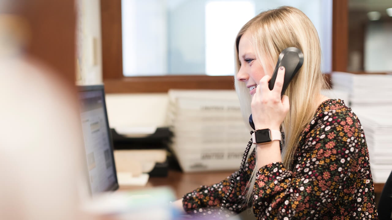 Person answering a phone