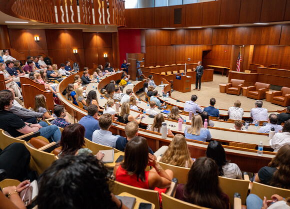 People sitting in a courtroom
