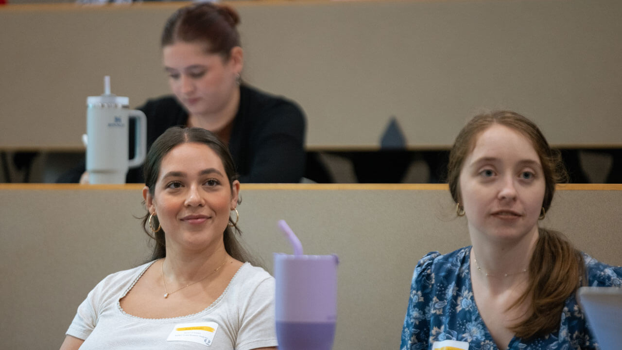 Graduate students attend orientation.