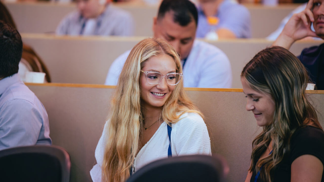 Grad students laughing and smiling