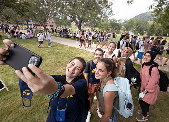 Students take a selfie at Welcome Weekend.