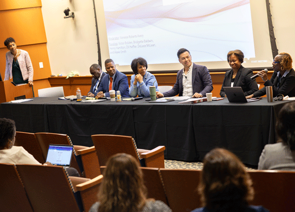 Panel of individuals at the School of Law talking