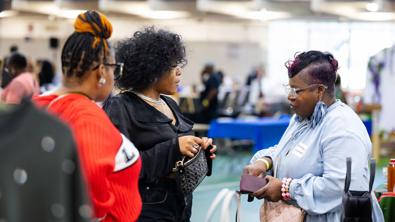 People browse the local booths at the Colors of Connecticut festival.