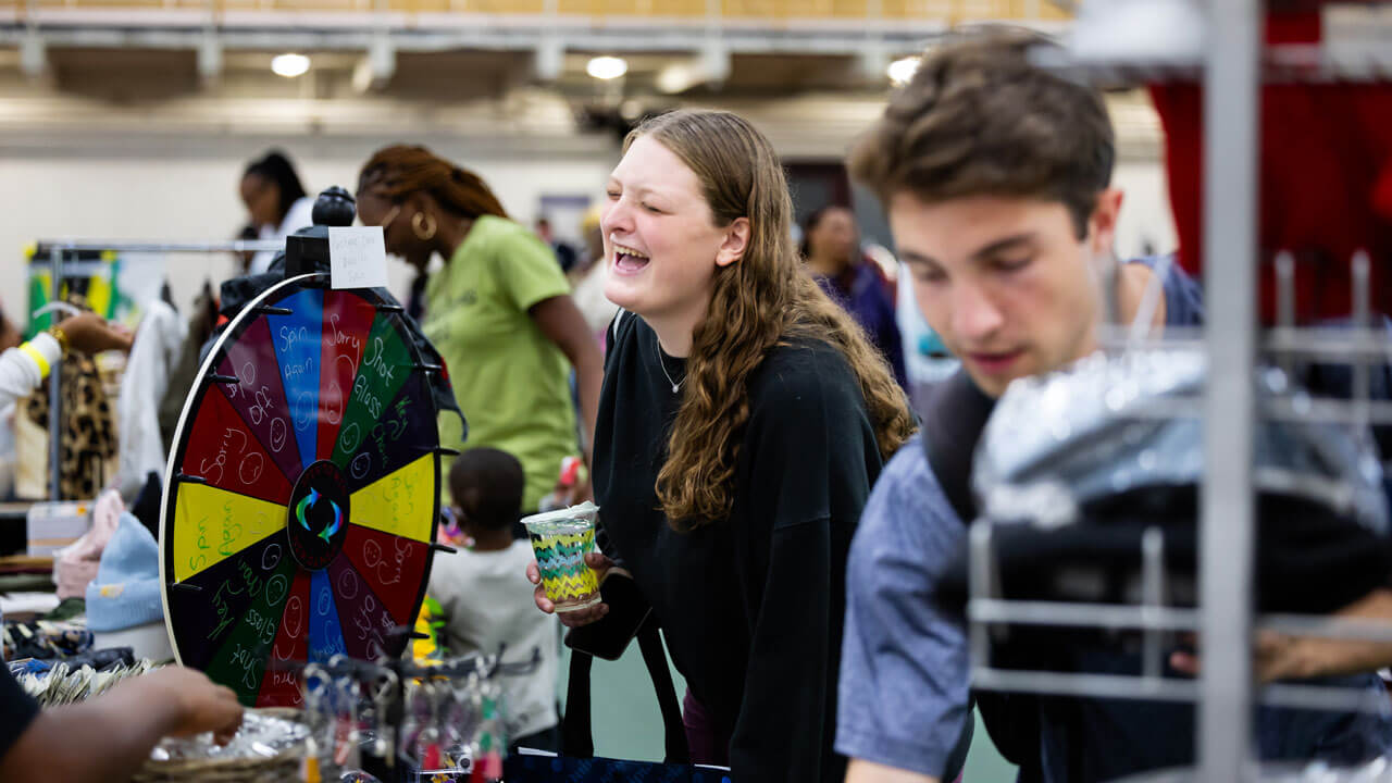 People browse the local booths at the Colors of Connecticut festival.