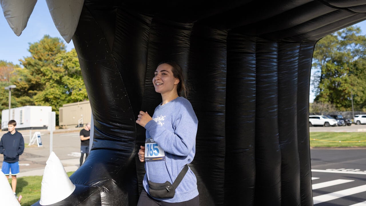 Runner finishing the race with a smile
