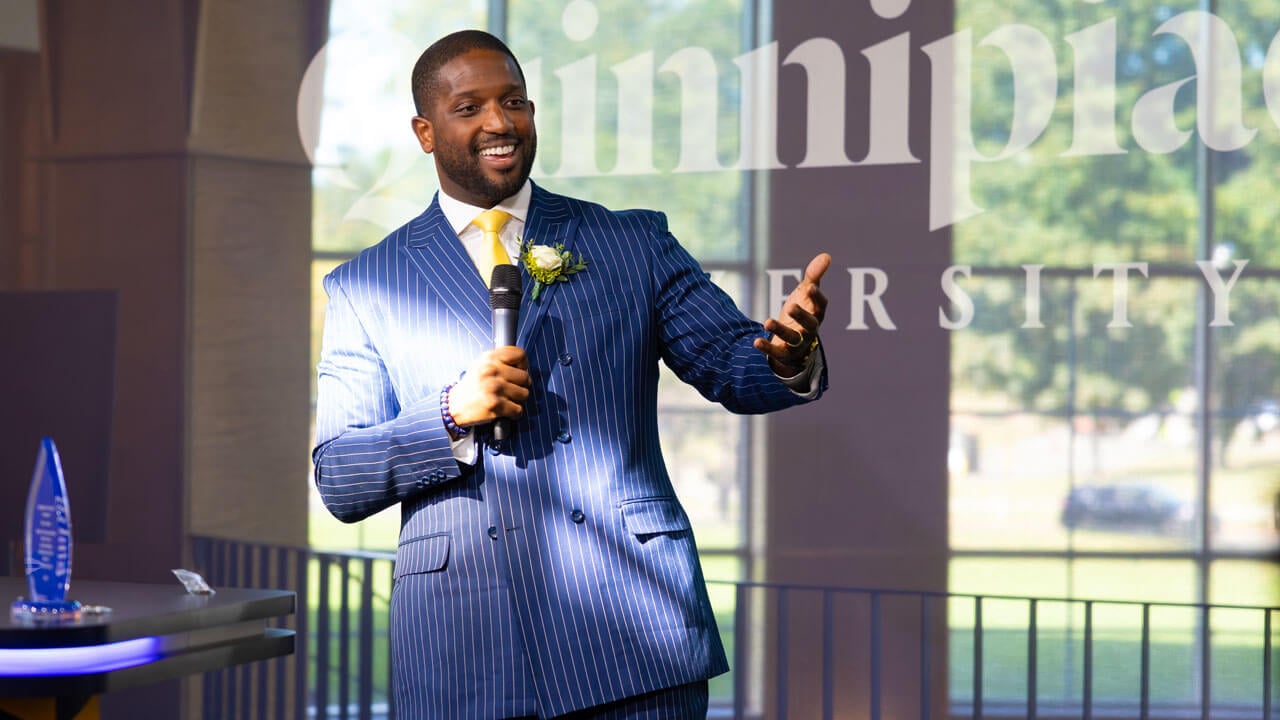 Speaker talks to crowd