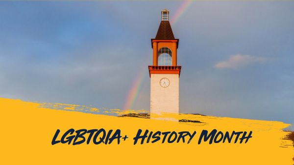A rainbow in the sky over the Arnold Bernhard Library clocktower.