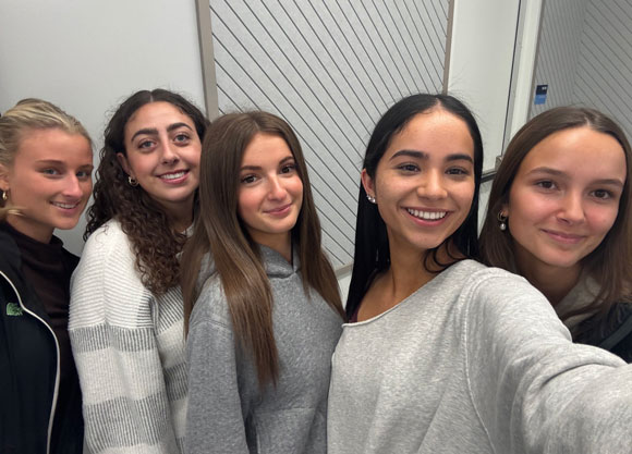 Women's Sideline Society executive board smiling for a selfie