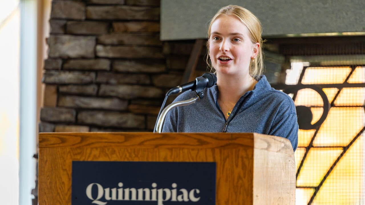Speaker looking out to the audience at the indigeneity initiative teach in