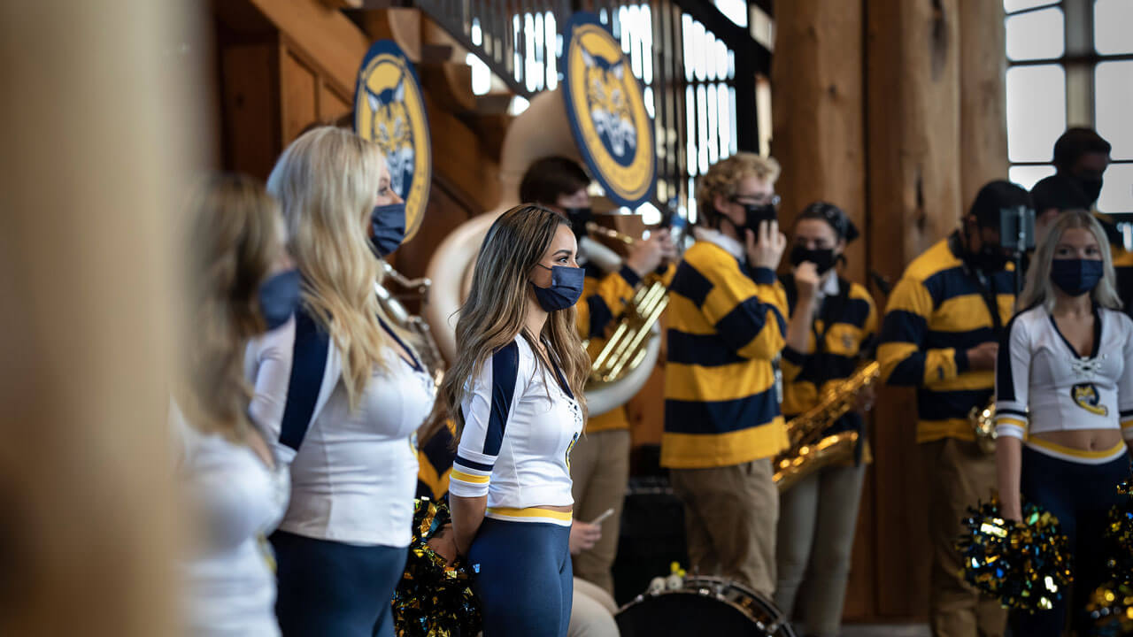 Ice cats and pep band performing in on the rocks pub