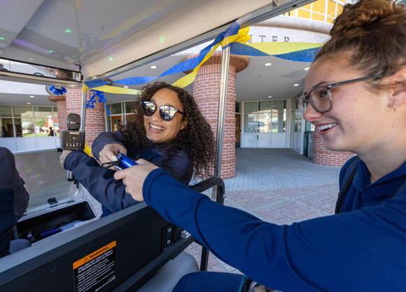 Steffany Almanzar hands out prizes in the conduct cab.