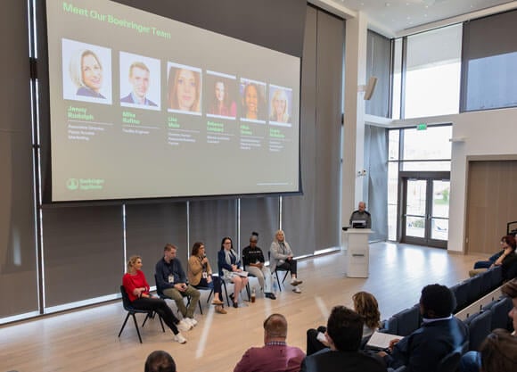 Panelists talking to audience