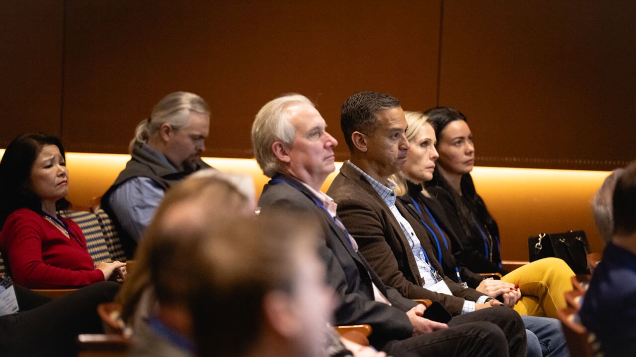 Crowd listens to speaker intently