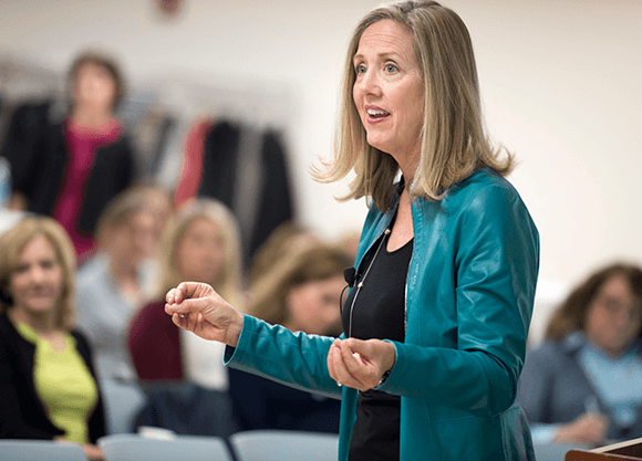 Cheryl L. Jones speaking during an interactive workshop.