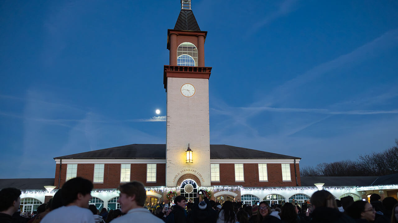 Lights line the library
