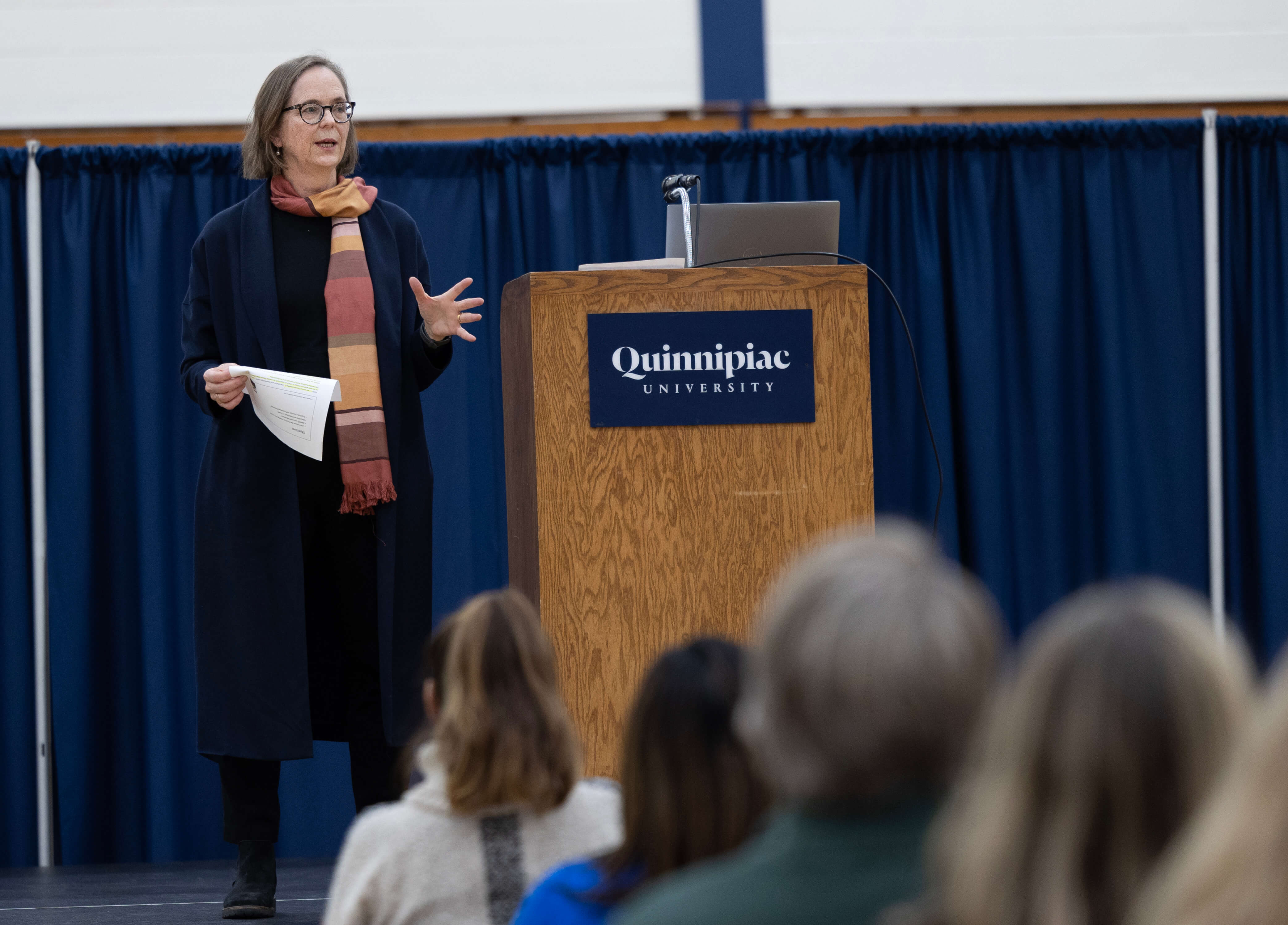 Woman speaks to an audience