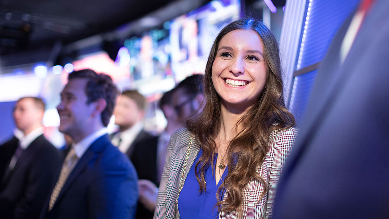 woman smiling on stock room floor