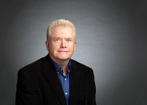 Headshot of Dennis Hanlon