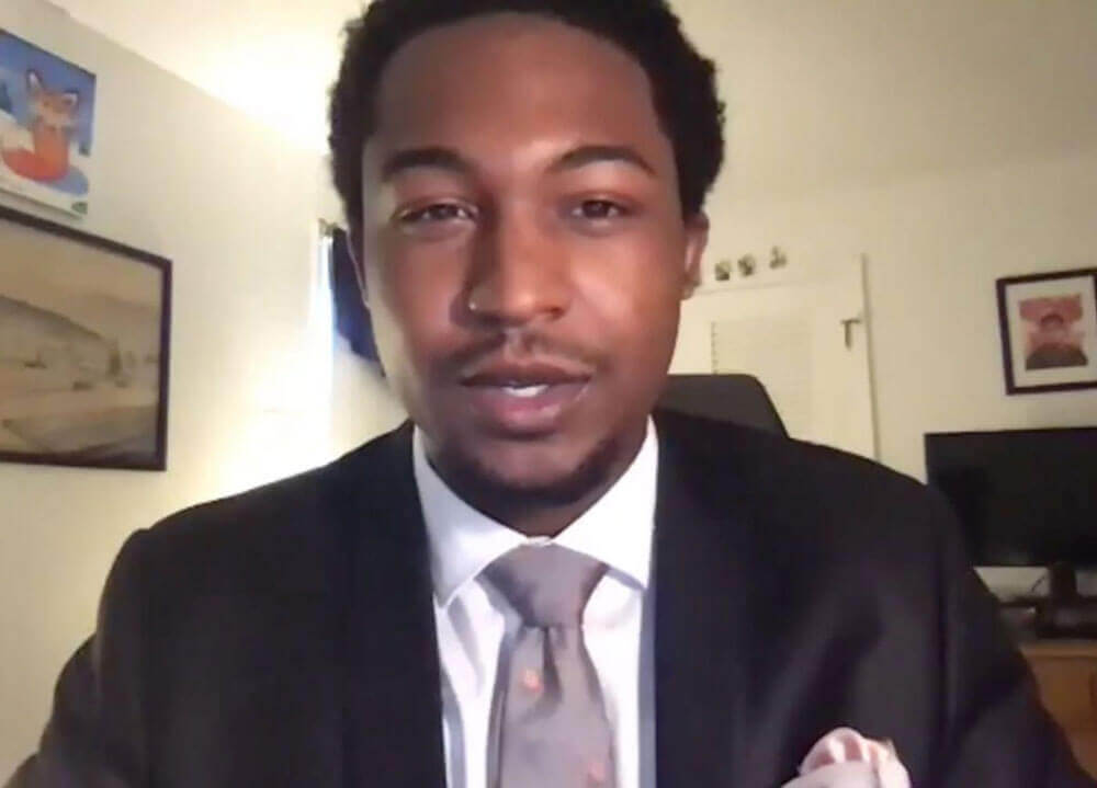 Morgan speaks on a Zoom call.