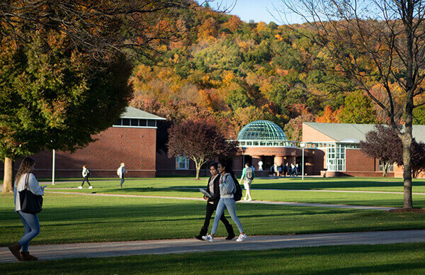 Students walk across the Quad