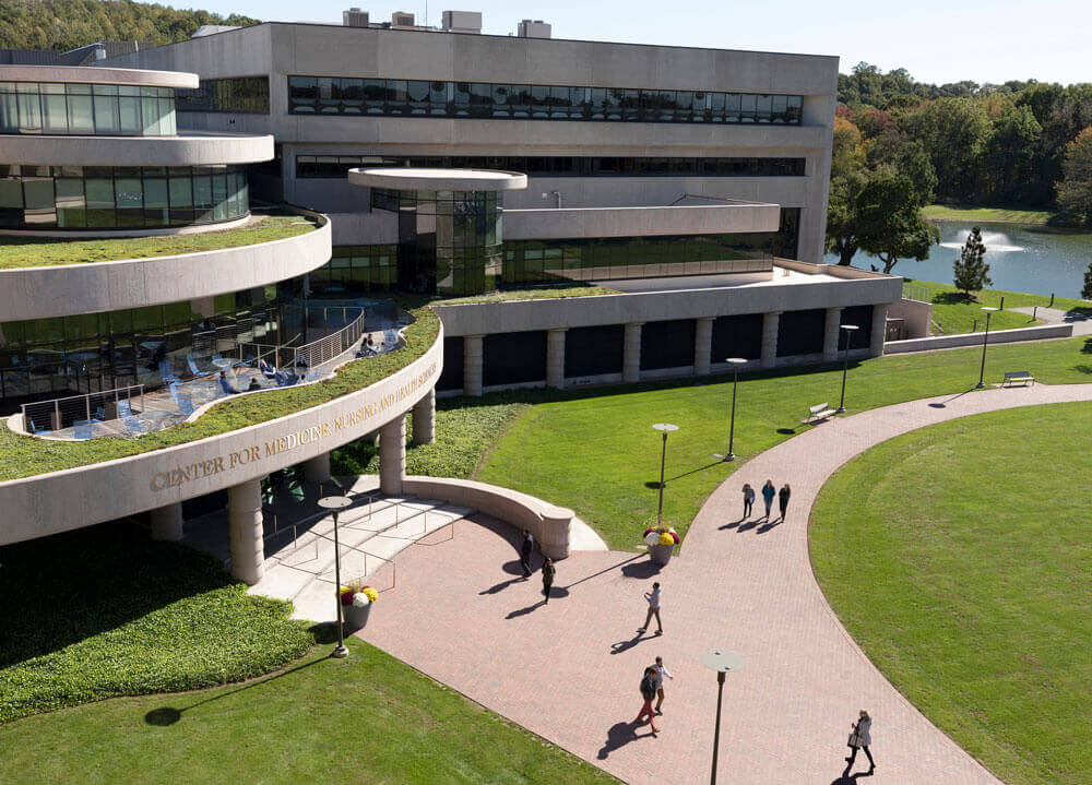 North Haven campus buildings, lawn, and pond
