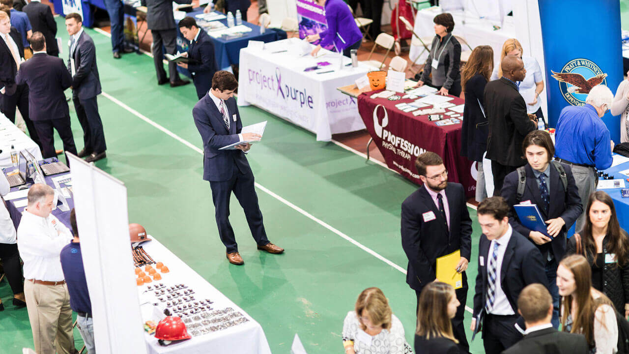 People walking on green floor